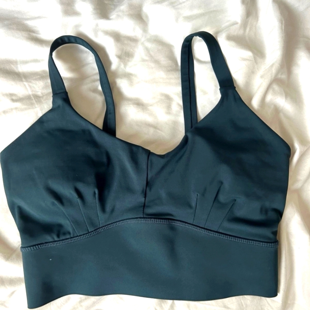 Bourne primitive sports bra. Size small, teal, comes with original bra pad inser